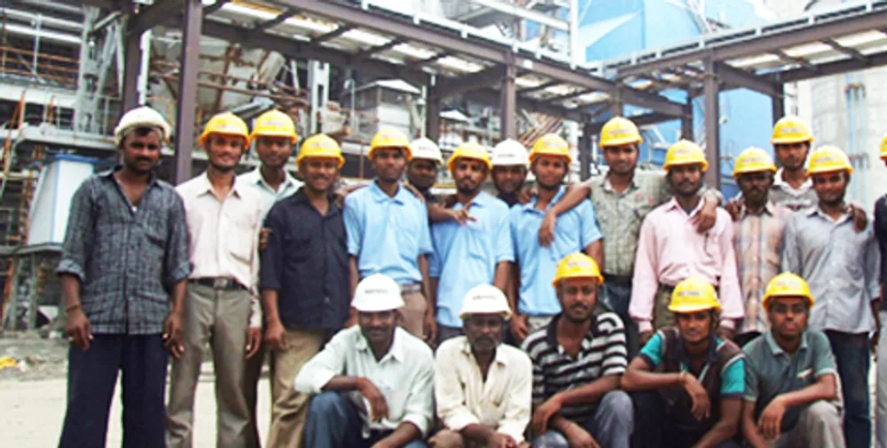 Engineering and site team assembled at an industrial project