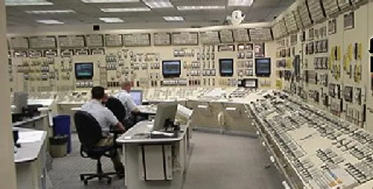Control room with operator stations and instrumentation panels
